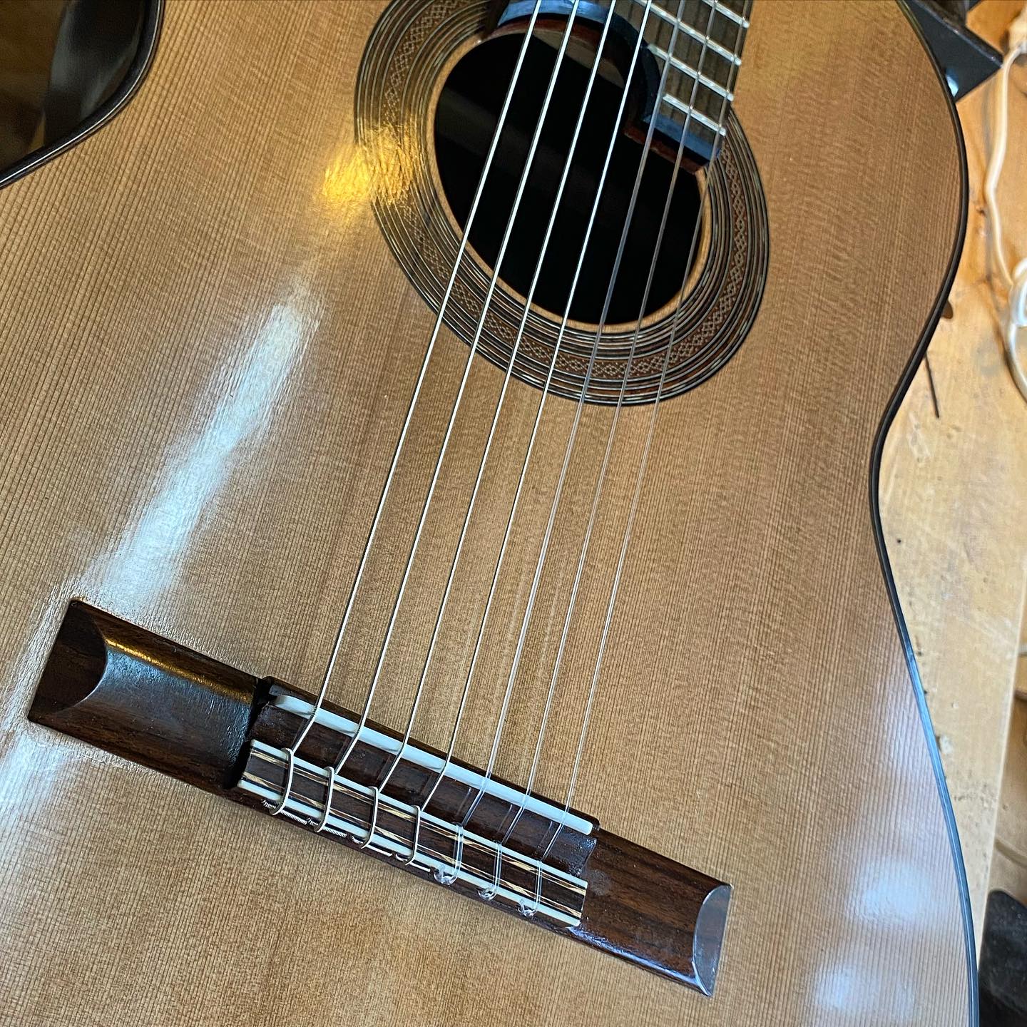 No where near done with French polishing, but since tomorrow a very good guitar player is coming over, I decided to put strings on, to hear it for the very first time.
#Guitar #guitarbuilding #guitarbuilder #luthier #luthiery #luthery #classicalguitar #acousticguitar #handmade #wood #woodworking #whatsonyourbench